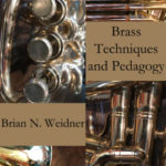 Brass Techniques and Pedagogy ebook cover image depicting closeups of brass instruments